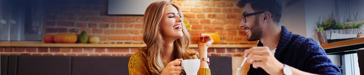 Couple sitting in a coffee cafe